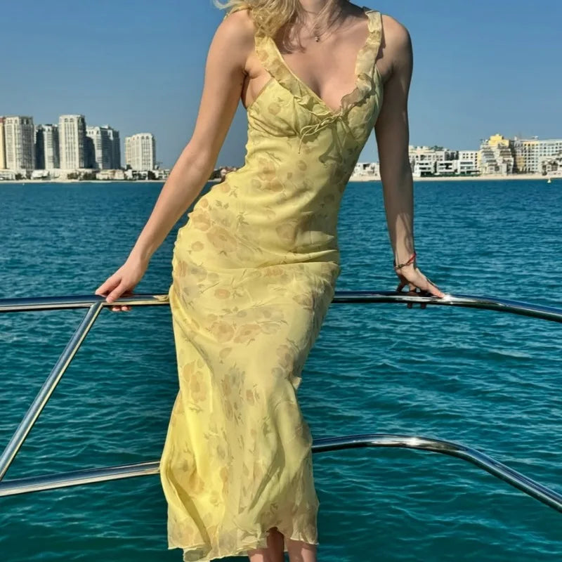 Gelbes, rückenfreies Midikleid mit Rüschen und Blumenmuster